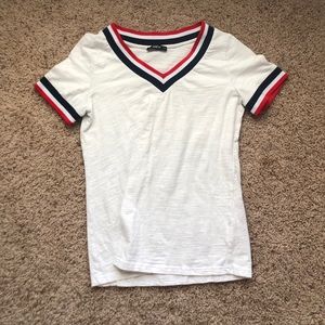 White T-shirt with red white and blue lining